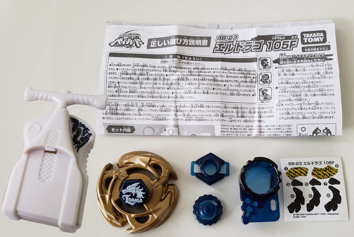 Side view of L-Drago 105F Beyblade BB-23 with left-spin design