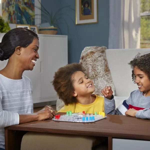 Kids playing Trouble board game for family entertainment